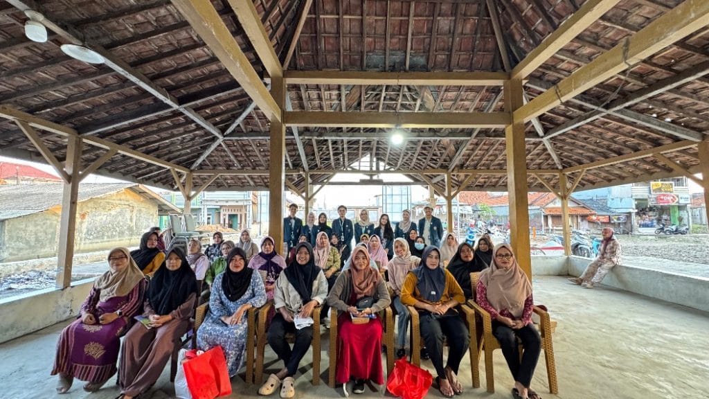 A group of people sitting in chairs under a roof AI-generated content may be incorrect.