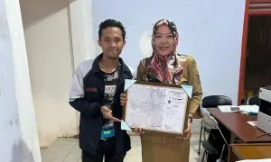 Penyerahan Peta Penomoran Rumah Desa Wangandowo di Balai Desa Wangandowo